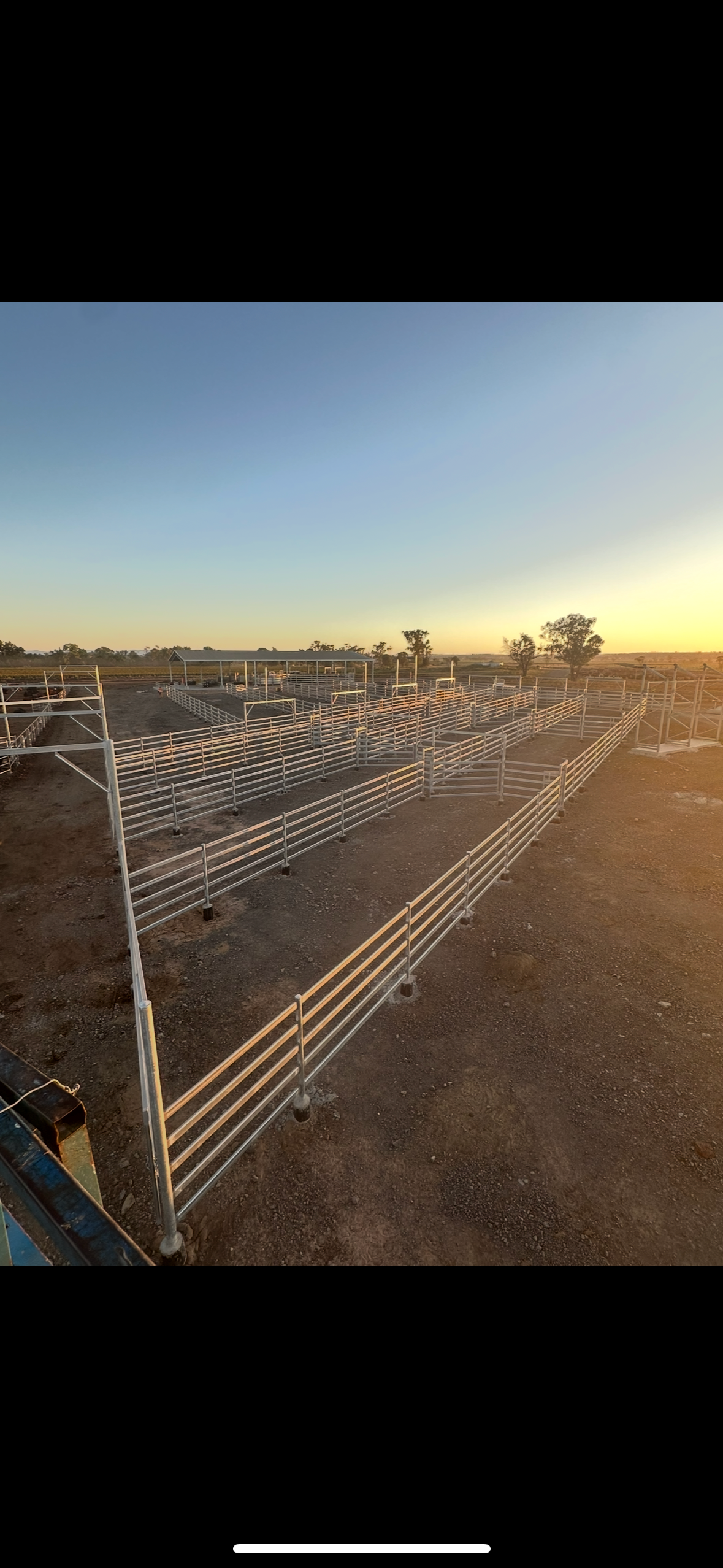 Frizzell Industries livestock yard build at sunset
